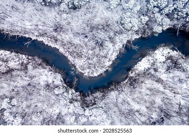 Winter River And Snowy Forest. Aerial View Of Winter In Poland, Europe