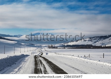 Winter road in the Altai mountains. Gorny Altai, Russia
