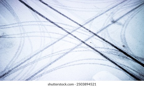 Winter road with intersecting tire tracks in snow, symbolizing life's crossroads and choices. - Powered by Shutterstock