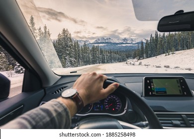 Winter Roadtrip With Canadian Rockies In The Background.