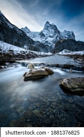 winter in Rosenlaui with Wellhorn and mountain creek Rychenbach, Switzerland - Shutterstock ID 1881376825