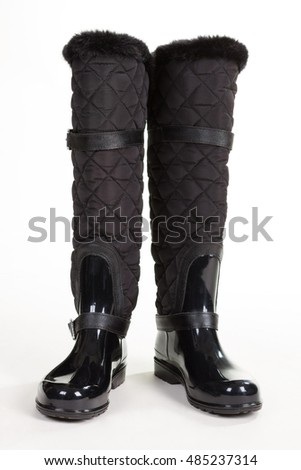 Similar – Image, Stock Photo Shiny rubber boots in the rain in front of a puddle-