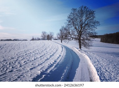 Winter rural road on a sunny frosty day. Czech Republic, Vysocina Highland region, Europe - Powered by Shutterstock
