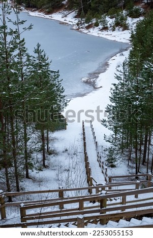Winter scene at the frozen Dubkalnu quarry in January in Ogre in Latvia