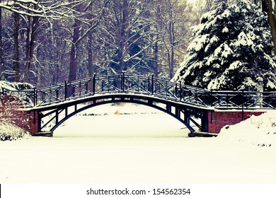 Winter Scene - Old Bridge In Winter Snowy Park