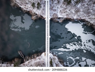 Winter scenery of the railway bridge in Rutki over Radunia river, Kashubia. Poland