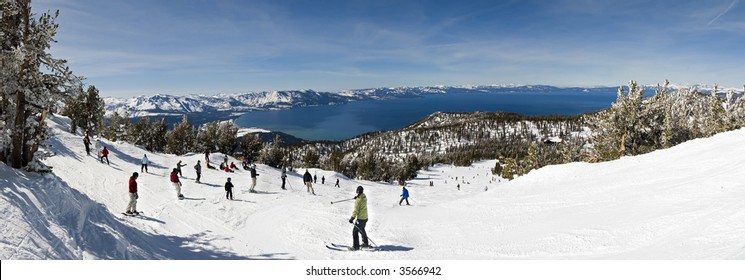 Winter Scenic Of People Skiing By Lake Tahoe