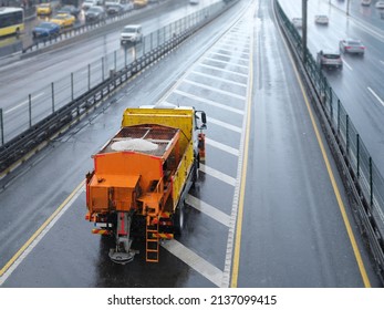 Winter Service Vehicle Clears Snow Covered Roads