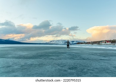 Winter Skating On A Frozen Lake In Northern Canada. 