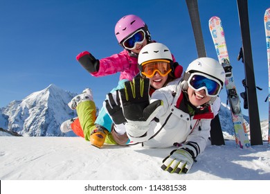 Winter, Ski, Snow And Fun  - Family Enjoying Ski Holiday