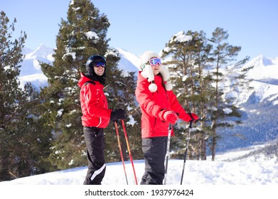 Winter, Skiing - Happy Family In A Ski Resort.