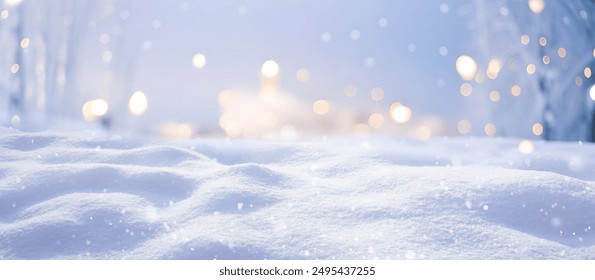 Winter snow background with snowdrifts, with beautiful light and snow flakes on the blue sky in the evening, banner format, copy space.