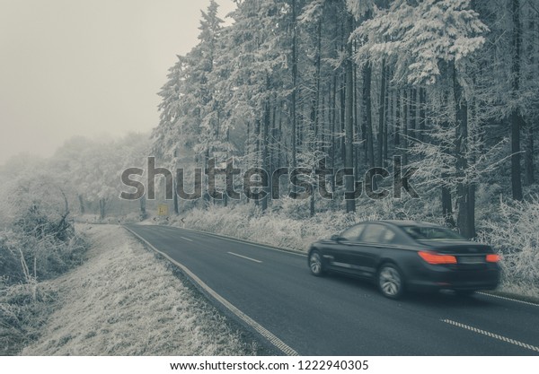Winter snow car drifting\
in the forest