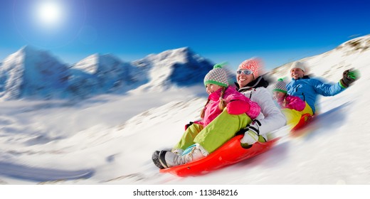 Winter, Snow, Family Sledding At Winter Time