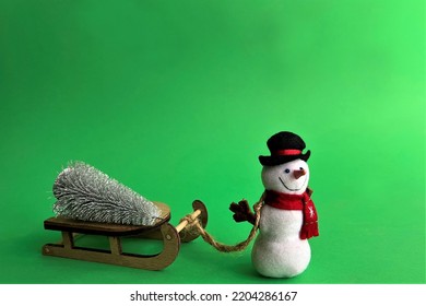 Winter Snowman With Christmas Tree On Green Screen Croma Key