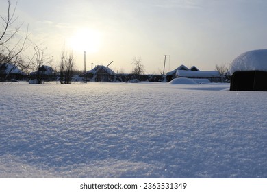 Winter snowy morning in the village - Shutterstock ID 2363531349