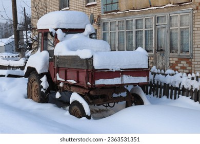 Winter snowy morning in the village - Shutterstock ID 2363531351