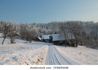 Winter Snowy Road In The Mountains, Small Village