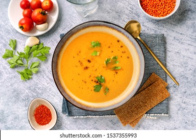 Winter Spicy Lentil Cream Soup On Light Blue Background