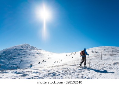 Winter sport for one background, Skialpinist on snowy mountains