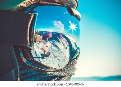 Winter Sports Concept - Male Snowboarder In Snowboard Mask At The Top Of A Mountain - Outdoors Shot