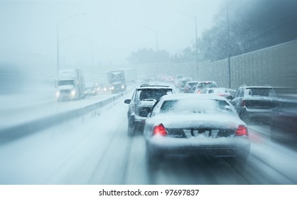 Winter Storm Traffic. I-294 Chicago Highway During Snow Storm. Heavy Snowfall and Heavy Traffic.