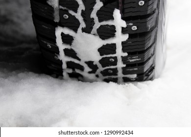 Winter Studded Tire In The Snow