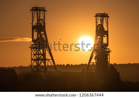 Similar – Image, Stock Photo When coal was still being delivered … Dilapidated Berlin apartment building with “Koks” written on it.