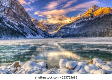 Winter sunrise over scenic Lake Louse in Banff National Park, Alberta Canada