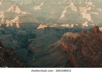 Winter sunset casting a shadow across the Grand Canyon