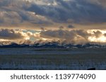 winter sunset east facing Bridger Mountains in Montana