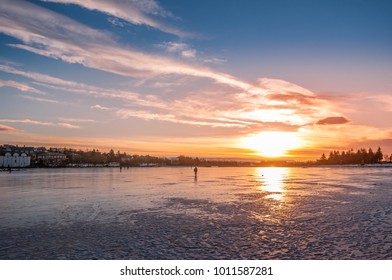 Winter Sunset At Tjörnin Lake In Reykjavik, Iceland