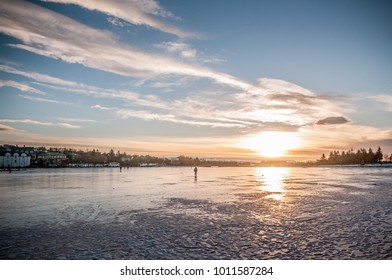 Winter Sunset At Tjörnin Lake In Reykjavik, Iceland