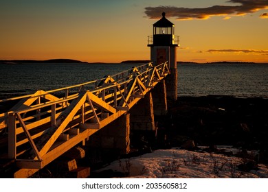 Winter Sunset At Lighthouse On The Maine Coast