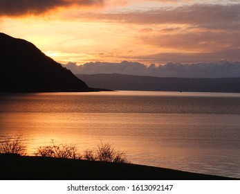 A winter sunset looking over Catacol Bay on the island of Arran towards Kintyre,Scotland,UK