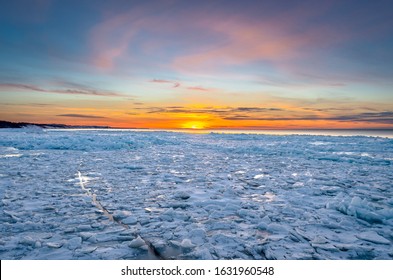 Winter Sunset Over Lake Superior Near The Pictured Rocks National Lakeshore, Grand Marais Michigan.