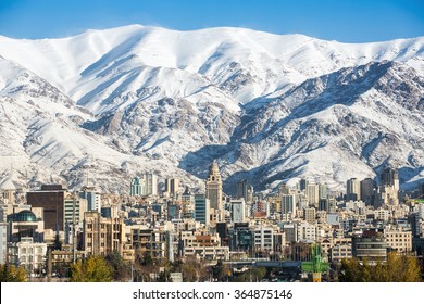 Winter Tehran  view with a snow covered Alborz Mountains on background