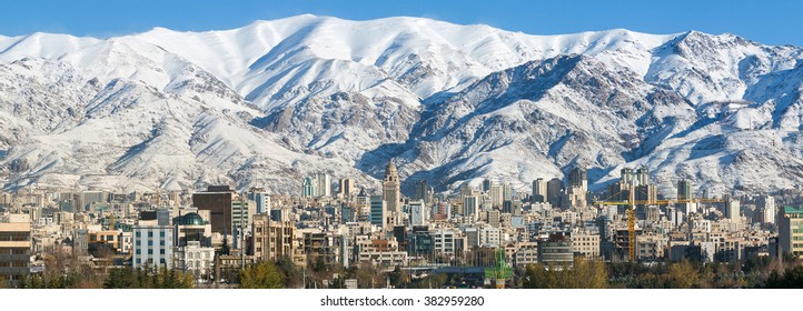 Winter Tehran View With A Snow Covered Alborz Mountains On Background. Panorama