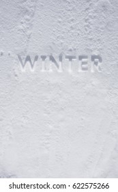 Winter Text Debossed In Snow