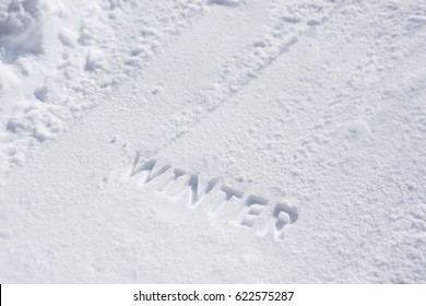 Winter Text Debossed In Snow