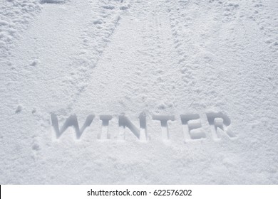 Winter Text Debossed In Snow