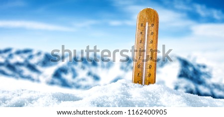 winter thermometer and snow 