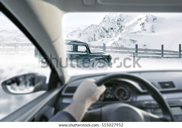 winter time and driver\
in car interior 