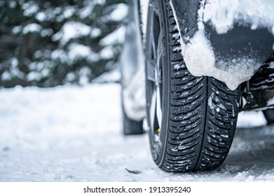 Winter Tire. Detail Of Car Tires In Winter On The Road Covered With Snow.