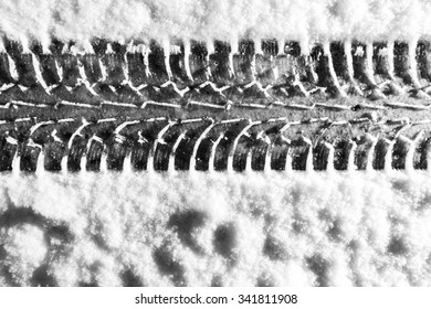 Winter Tire Print In The Snow In Finland. Image Includes A Black And White Effect.