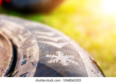 Winter Tires Close Up. Self Replacement Of Winter Tires On A Car With Summer Wheels. Swap Winter Wheel For Summer Tire.