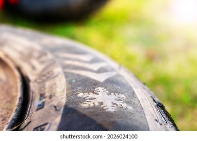 Winter Tires Close Up. Self Replacement Of Winter Tires On A Car With Summer Wheels. Swap Winter Wheel For Summer Tire.