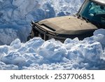 Winter tires. Off road in snow on the mountains. Offroad vehicle in snow. Off road vehicle in the forest, drift in the snow. SUV Off road in a Snowstorm. Cars off-roads trip, winter car 4x4 track.