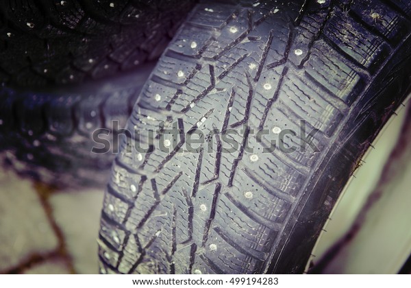 Winter tyre. Symbol showing how good the
tire is. Image has a vintage effect
applied.