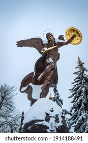 Winter view of the bronze sculpture of the Archangel Michael in Kiev on vladimirs mountain